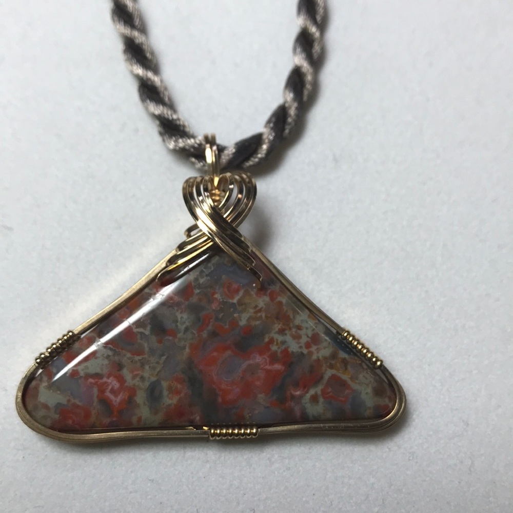 Petrified Dinosaur Dung Pendant.